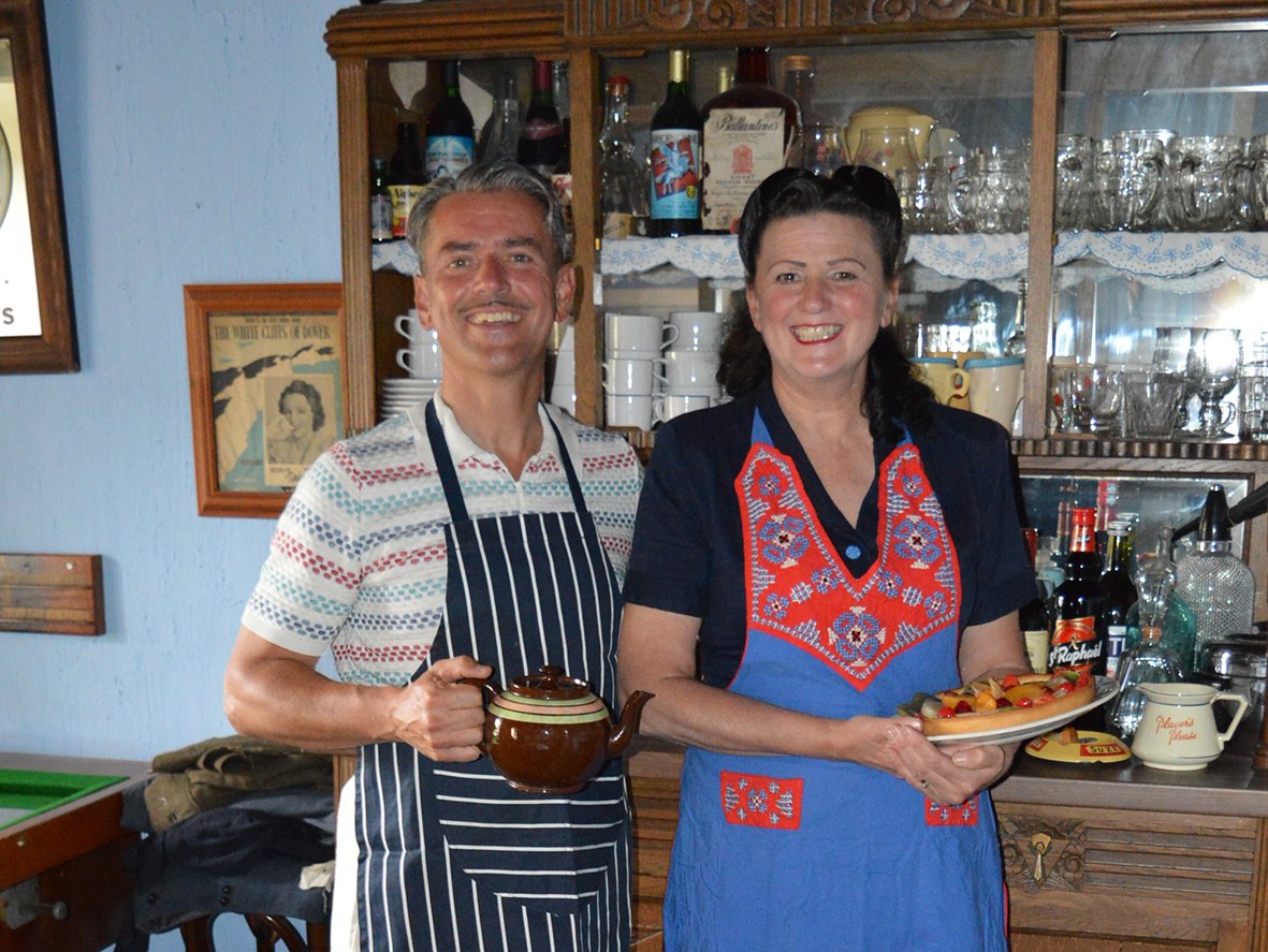 Mike and Deb van den Dobbelsteen in vintage dress at Le Pont de la Pierre
